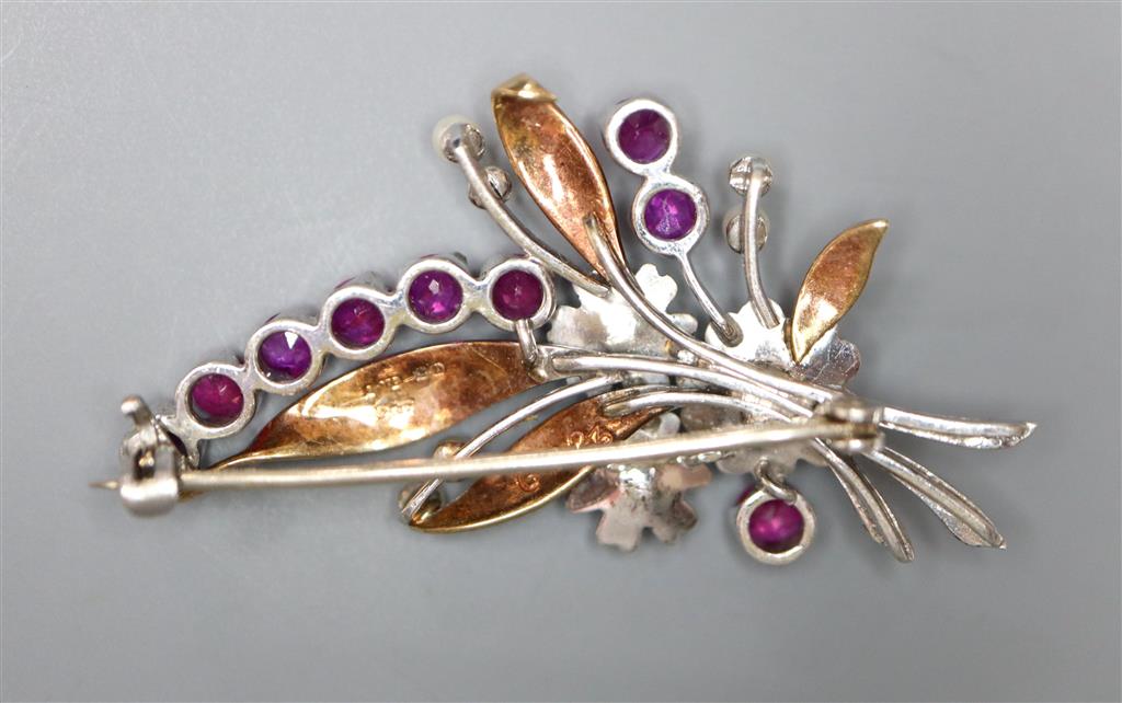 A modern 9ct gold, ruby, emerald and seed pearl set foliate spray brooch, 41mm, gross 6.4 grams.